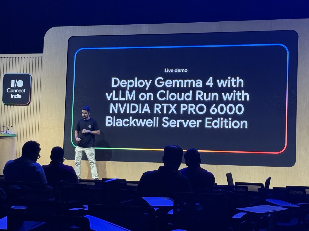 A live demo on stage titled Deploy Gemma 4 with vLLM on Cloud Run